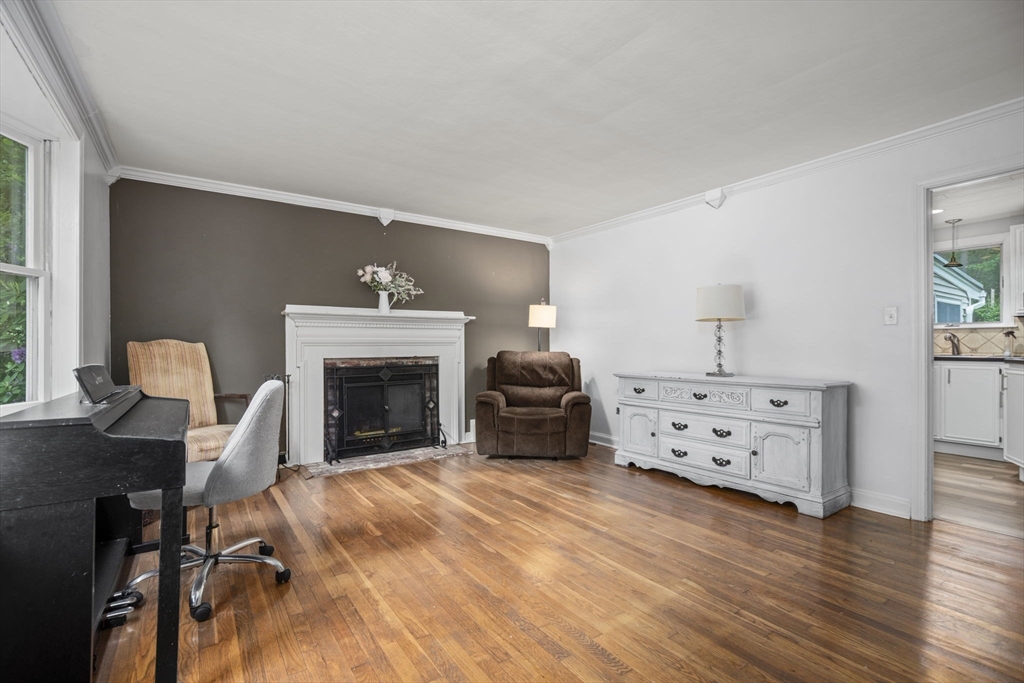 50 Haverhill Road Topsfield, MA 01983 - Photo 5 of 42 a living room with furniture and a fireplace