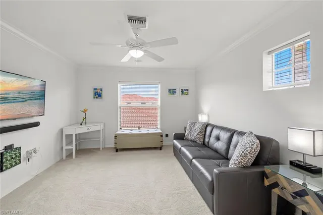 a front view of a house with a yard and a garage