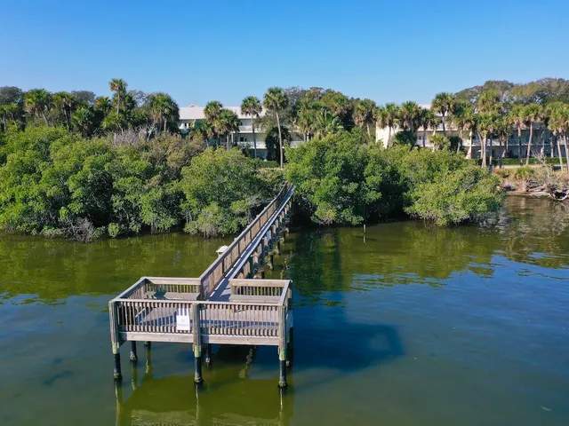 a view of a lake with a deck