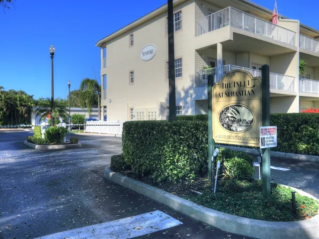 a view of buildings and small yard