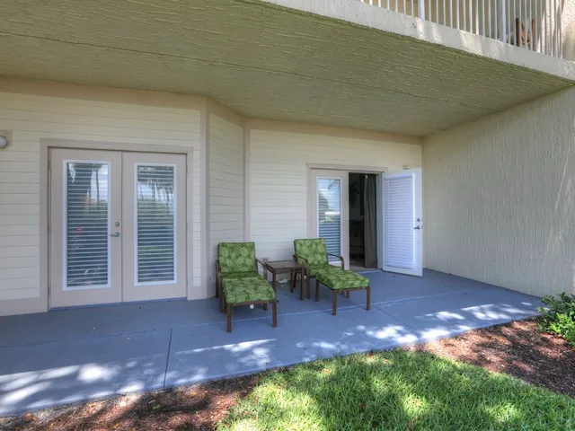 an aerial view of house with yard swimming pool and outdoor seating