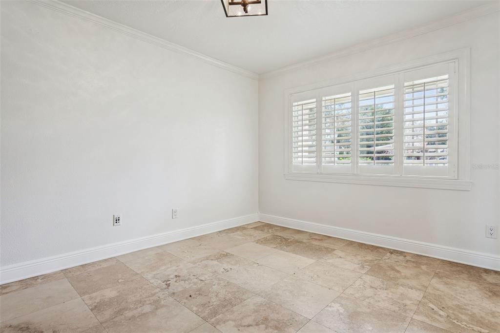 11606 Lipsey Road Tampa, FL 33618 - Photo 23 of 100 an empty room with a window