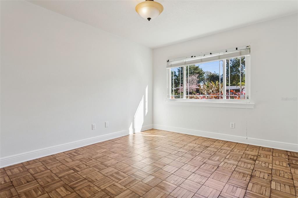 11606 Lipsey Road Tampa, FL 33618 - Photo 39 of 100 a view of an empty room with a window