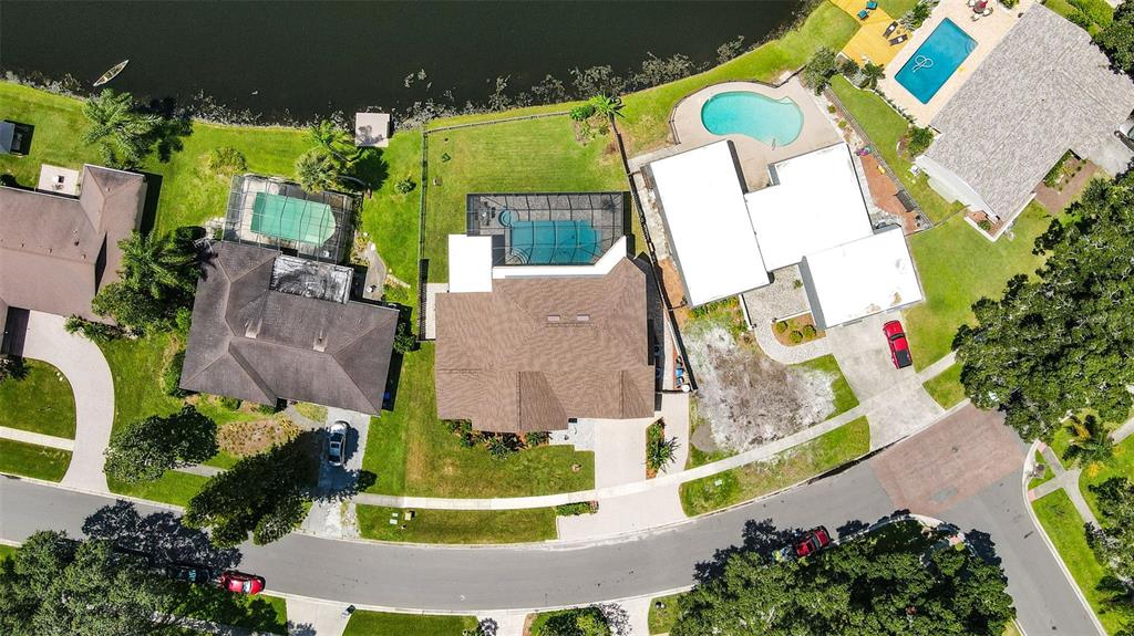 11606 Lipsey Road Tampa, FL 33618 - Photo 73 of 100 an aerial view of a house with a yard and swimming pool
