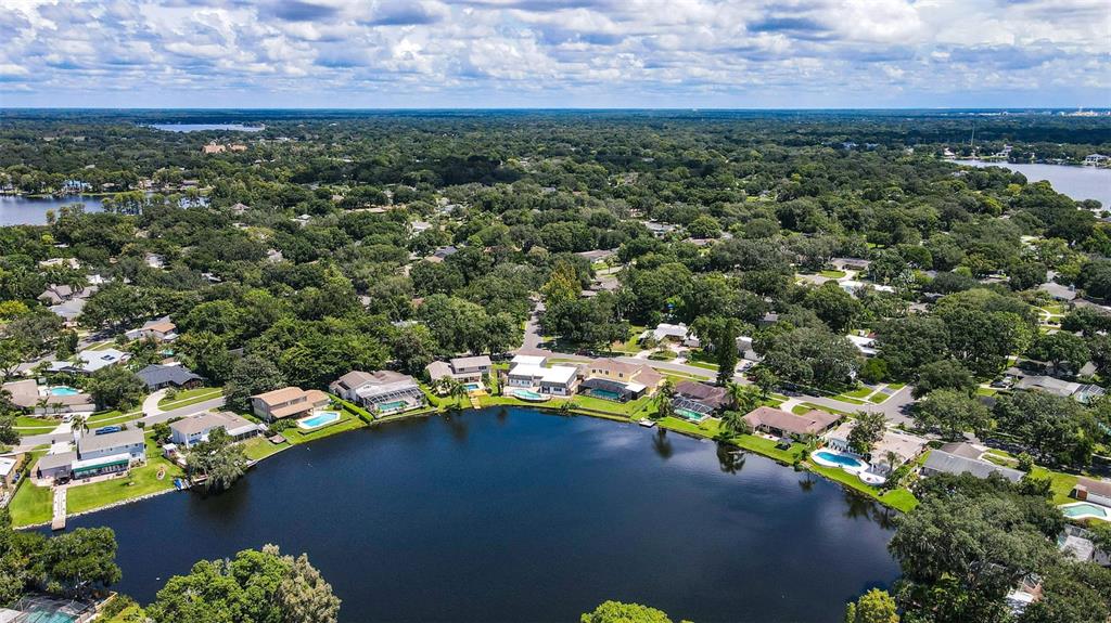 11606 Lipsey Road Tampa, FL 33618 - Photo 79 of 100 an aerial view of a houses with a yard