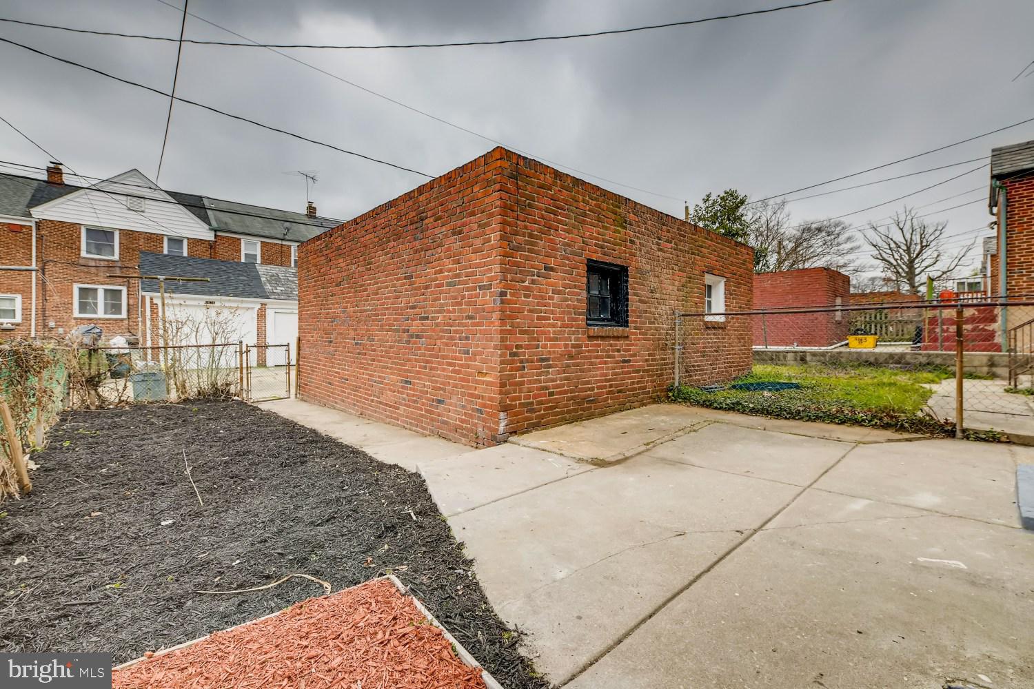 1639 Shadyside Road Baltimore, MD 21218 - Photo 24 of 25 Backyard and garage