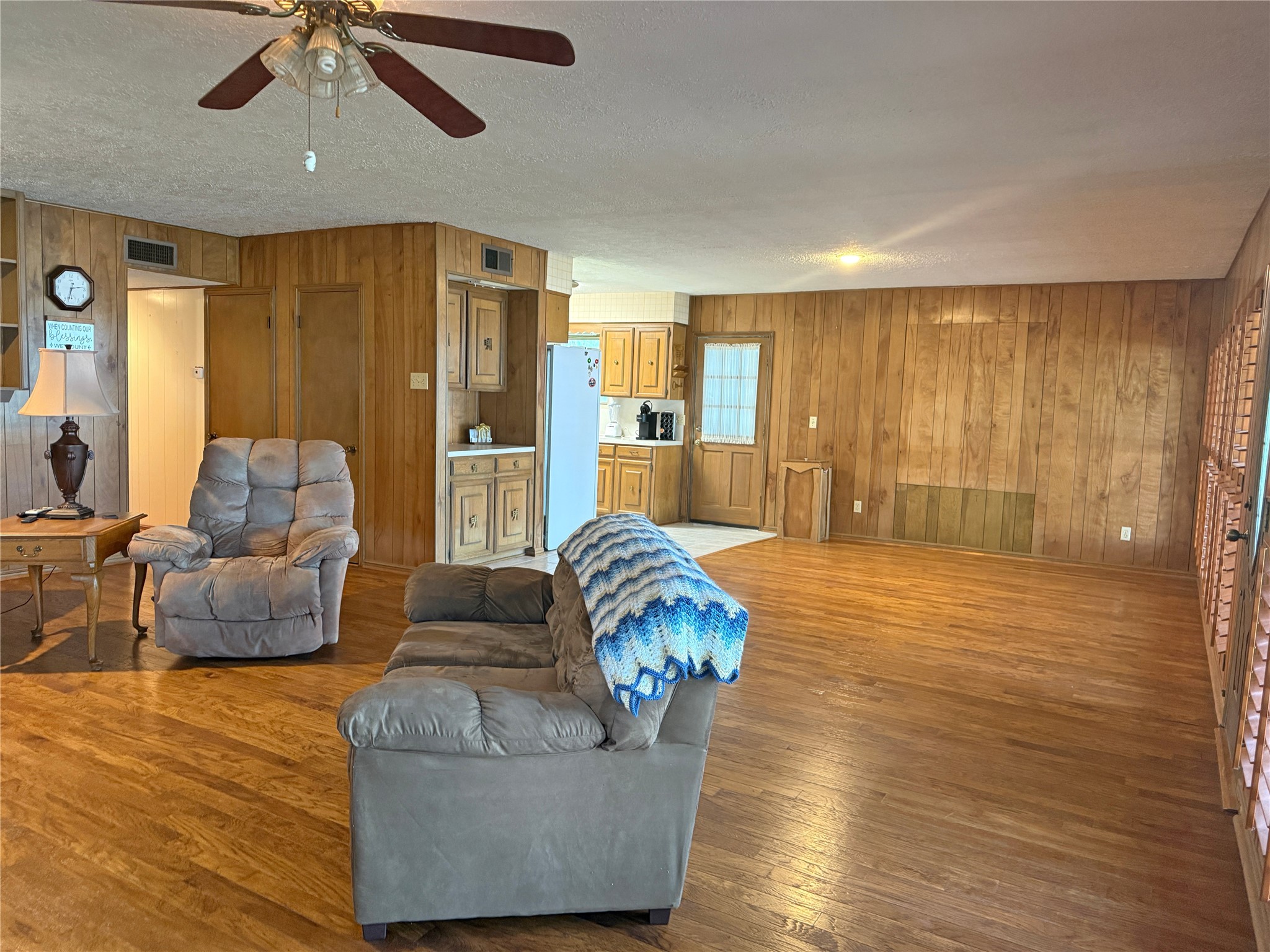 192 Sam Houston Loop Point Blank, TX 77364 - Photo 9 of 42 Facing the dining area and kitchen from the living room.