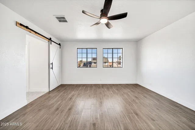 a bathroom with a double vanity sink mirror and shower
