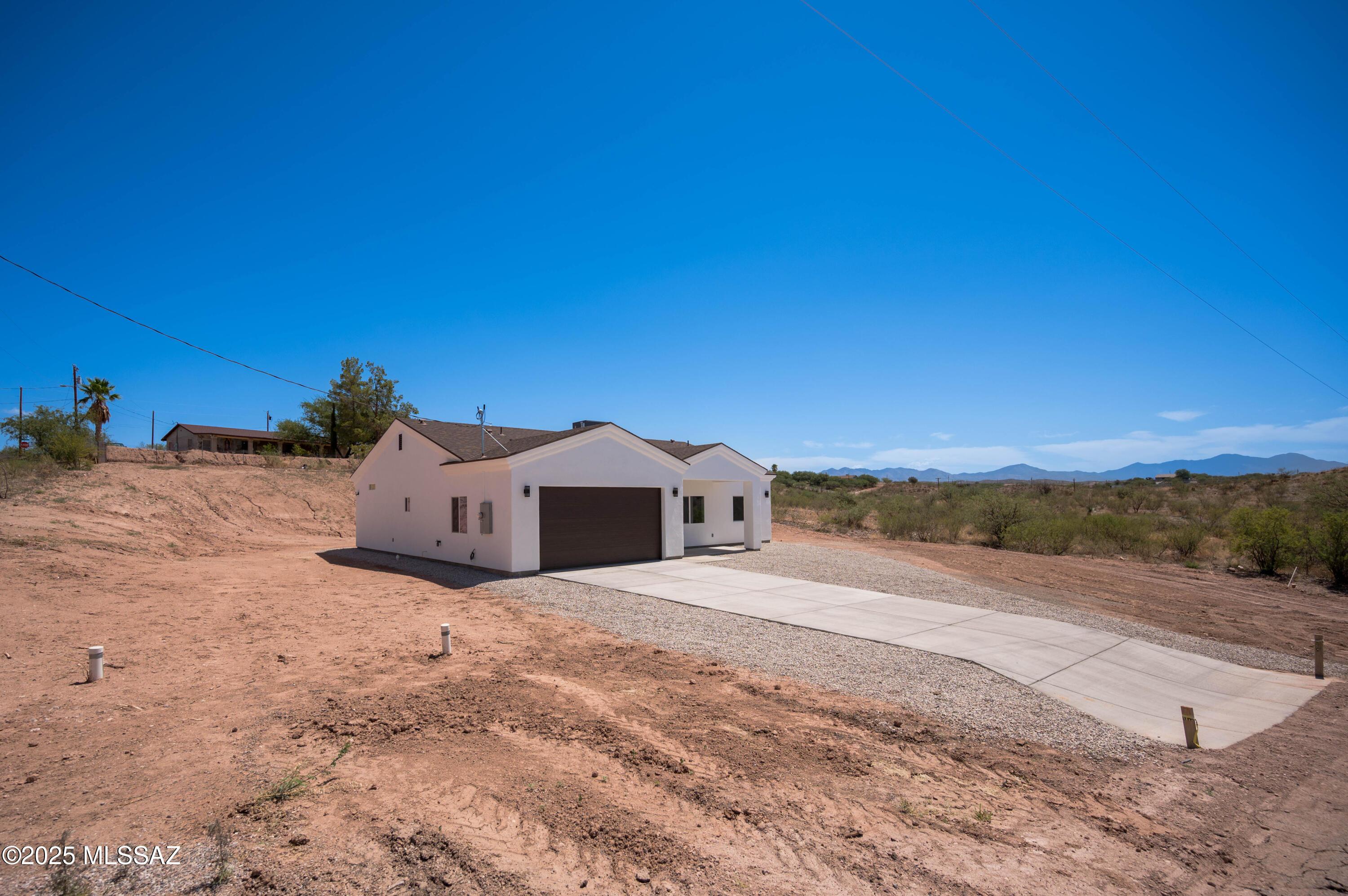 280 Donna Court Rio Rico, AZ 85648 - Photo 2 of 50 a view of a house with a yard