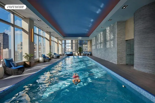 a bathroom with a sink toilet and mirror