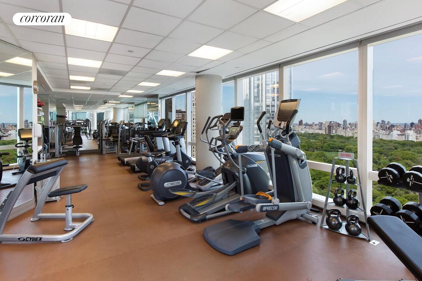 25 Columbus Circle, Unit 61G Manhattan, NY 10035 - Photo 15 of 23 a view of a room with gym equipment