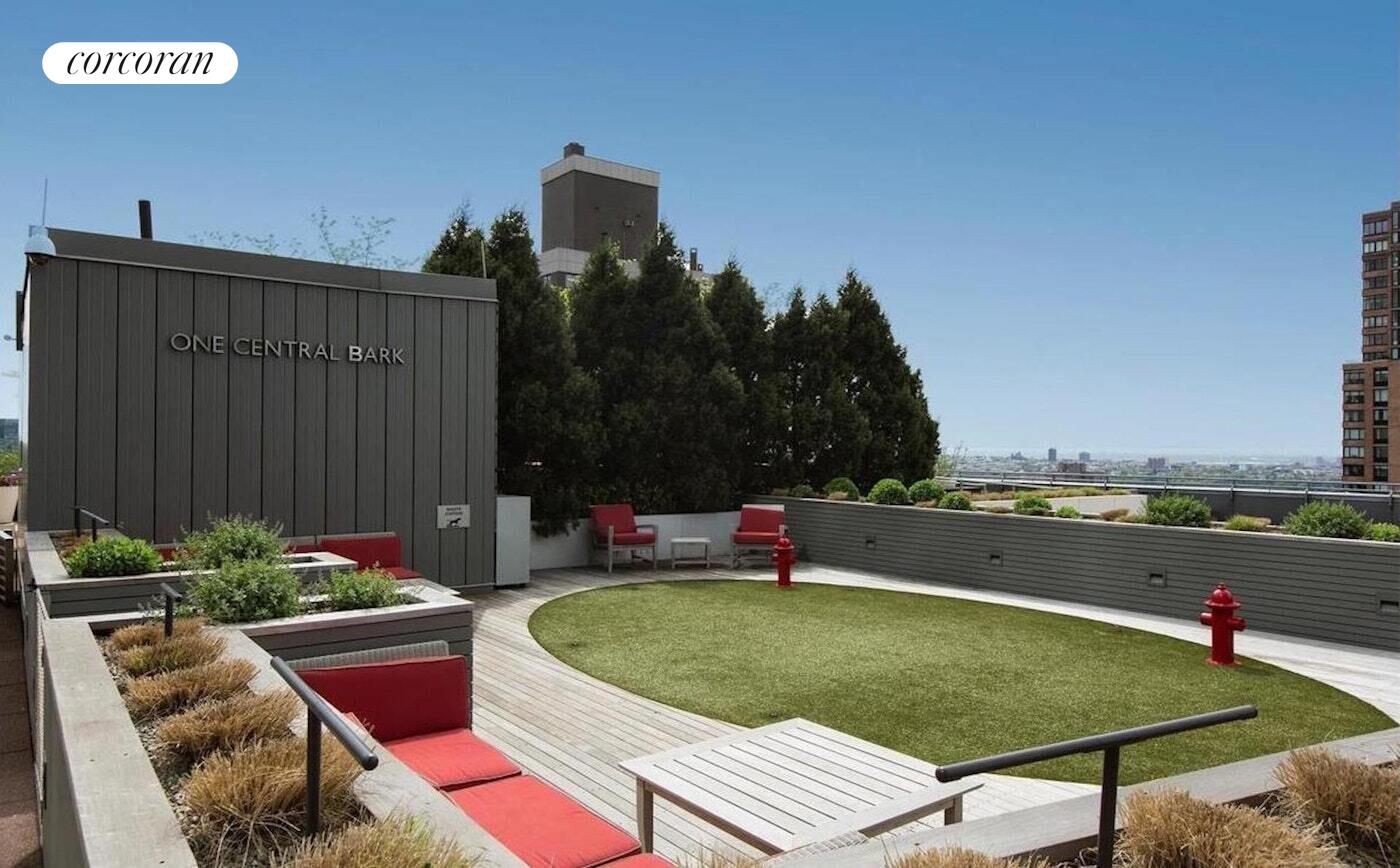 25 Columbus Circle, Unit 61G Manhattan, NY 10035 - Photo 16 of 23 a terrace with outdoor seating and city view