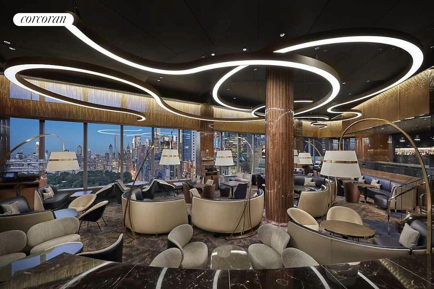 25 Columbus Circle, Unit 61G Manhattan, NY 10035 - Photo 19 of 23 a dining room with furniture and wooden floor