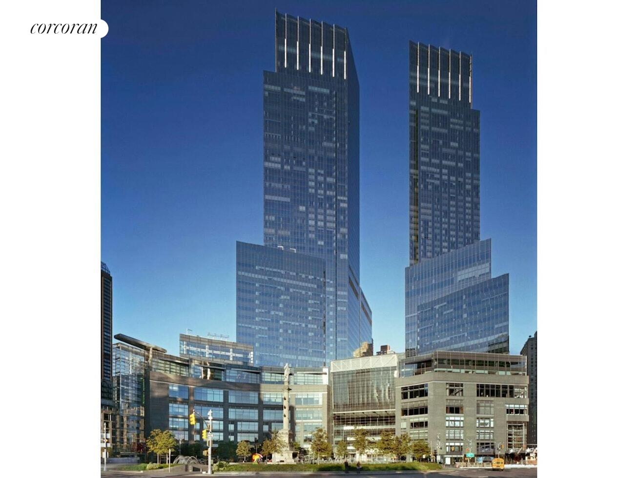 25 Columbus Circle, Unit 61G Manhattan, NY 10035 - Photo 22 of 23 a tall building with a street