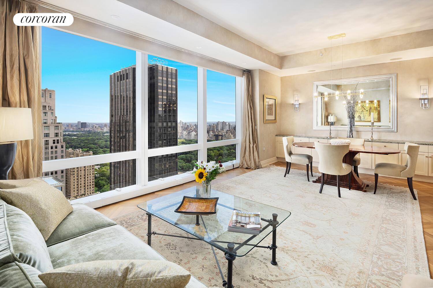 25 Columbus Circle, Unit 61G Manhattan, NY 10035 - Photo 5 of 23 a living room with furniture and a large window