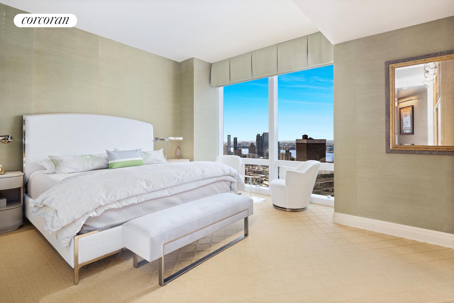 25 Columbus Circle, Unit 61G Manhattan, NY 10035 - Photo 8 of 23 a bedroom with bed and window