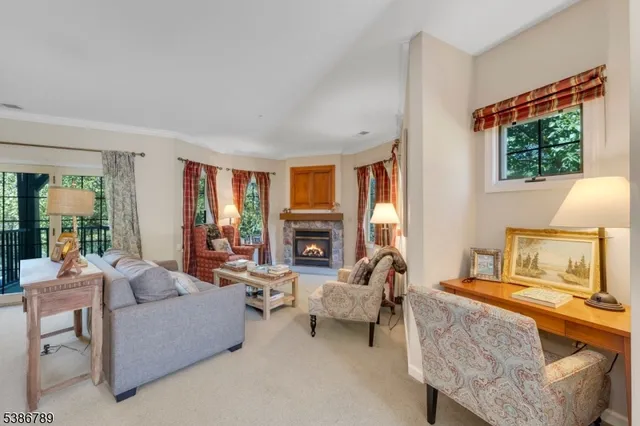 a kitchen with stainless steel appliances granite countertop a refrigerator and a stove
