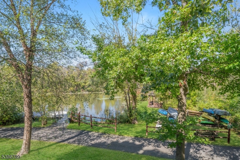 1 Maple Crescent, Unit 13 Vernon, NJ 07462 - Photo 25 of 29 a view of a garden with a bench