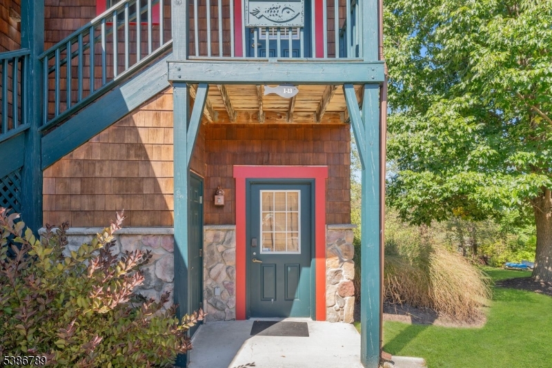 1 Maple Crescent, Unit 13 Vernon, NJ 07462 - Photo 3 of 29 a front view of a house with a yard