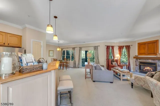 a living room with furniture and a table