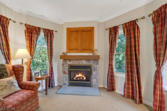 a bedroom with a bed and a night stand