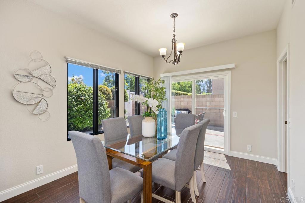 6 Cape Cod Irvine, CA 92620 - Photo 4 of 41 a view of a dining room with furniture window and wooden floor