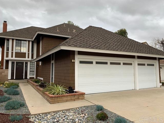 6 Cape Cod Irvine, CA 92620 - Photo 7 of 41 a front view of a house with entryway