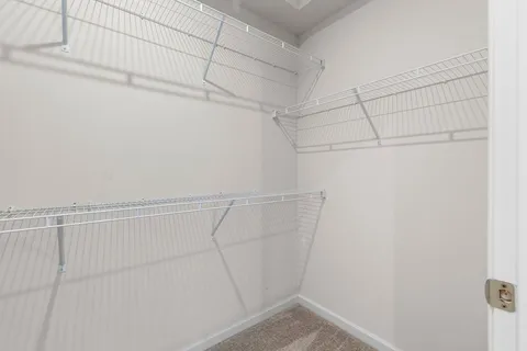 a view of a room with racks on the wall