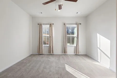 an empty room with windows