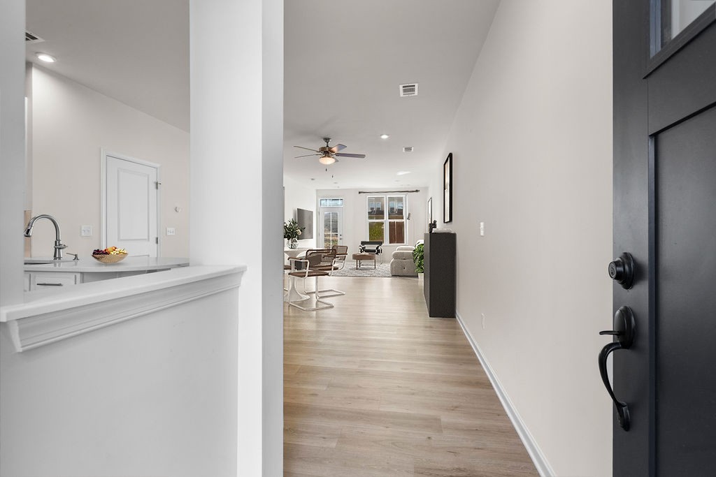 242 Marion Drive Spring Hill, TN 37174 - Photo 5 of 24 a view of a kitchen from the hallway