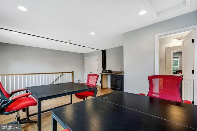 a view of a two chairs in the patio