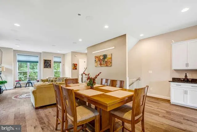 a large kitchen with a stove and cabinets