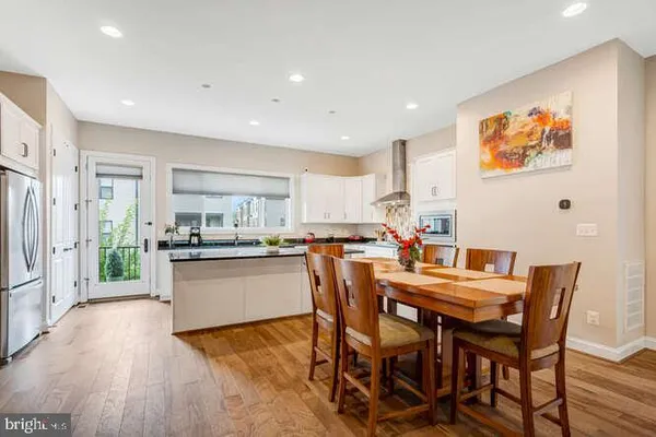 a spacious bathroom with a double vanity sink and a mirror