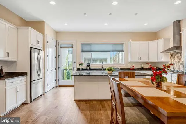 a bedroom with double bed and a window
