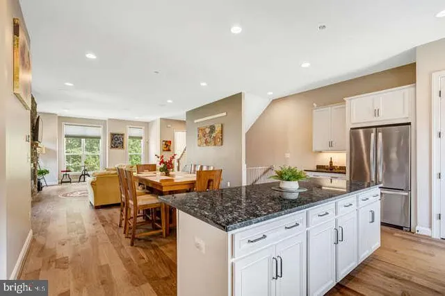 a bathroom with a sink a mirror and shower
