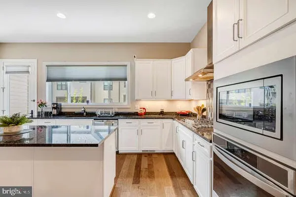 a view of a chairs and table in the patio