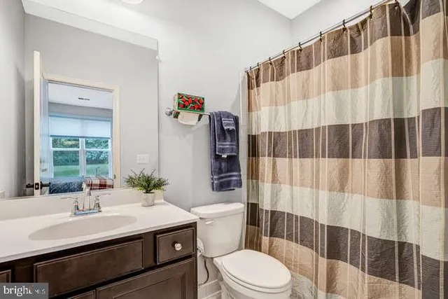 a view of a room with lounge chair windows