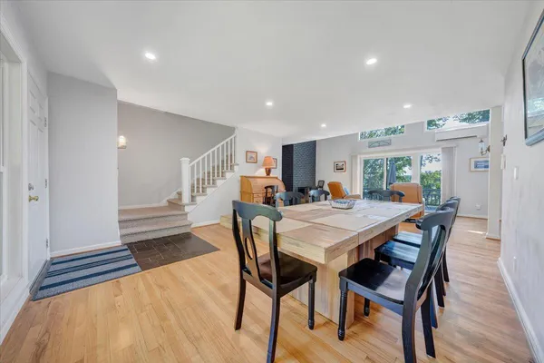 a kitchen with stainless steel appliances granite countertop a stove sink and cabinets