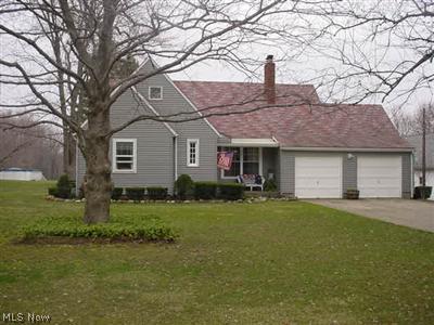 1185 Johns Road Clinton, OH 44216 - Photo 1 of 1 Don't be fooled by the inimate facade, this cape is far more spacious than you would think!