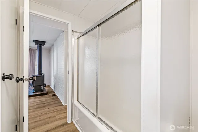 a view of a bathroom from the hallway