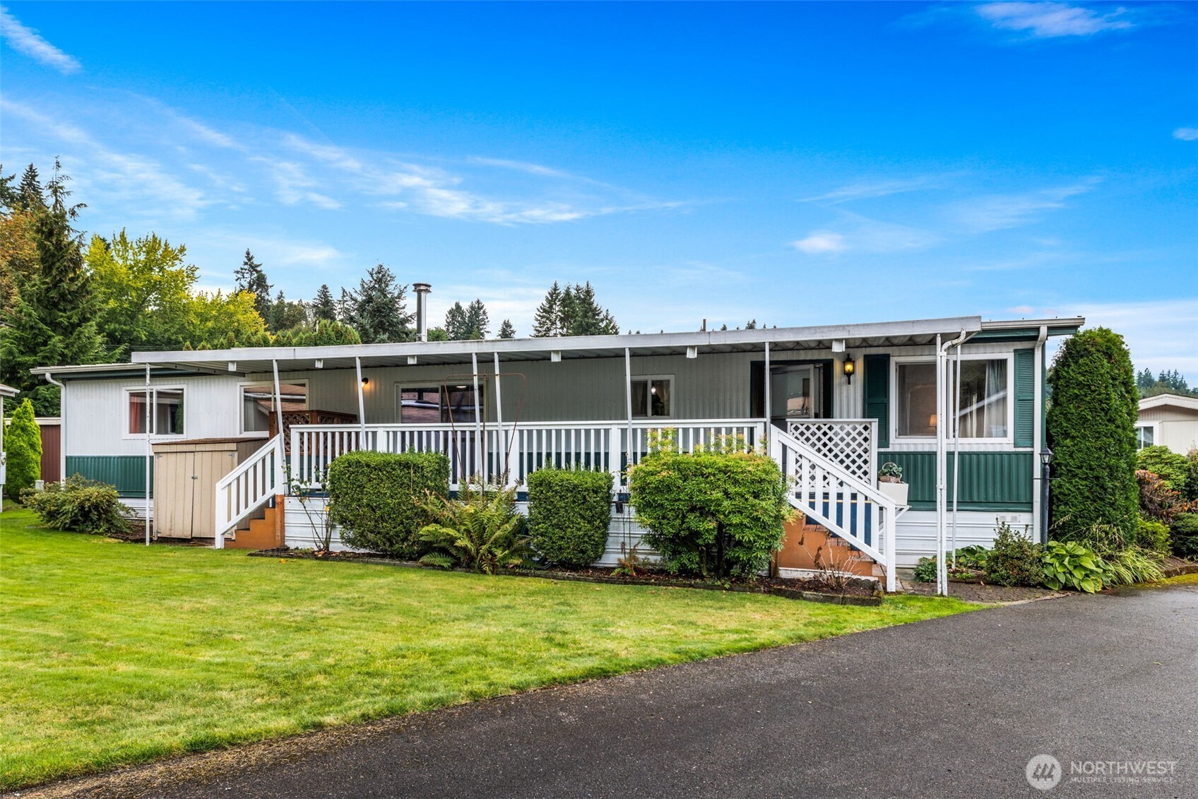 11330 East Riverside Drive, Unit 7 Bothell, WA 98011 - Photo 27 of 32 front view of a house with a yard