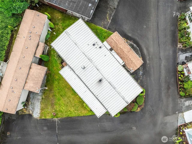a view of a street with barn