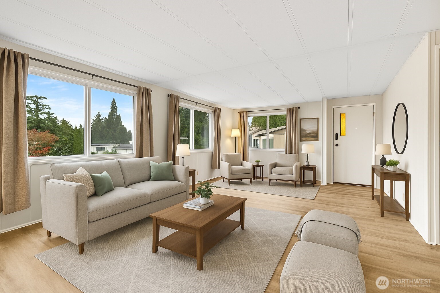 11330 East Riverside Drive, Unit 7 Bothell, WA 98011 - Photo 7 of 32 a living room with furniture and floor to ceiling windows