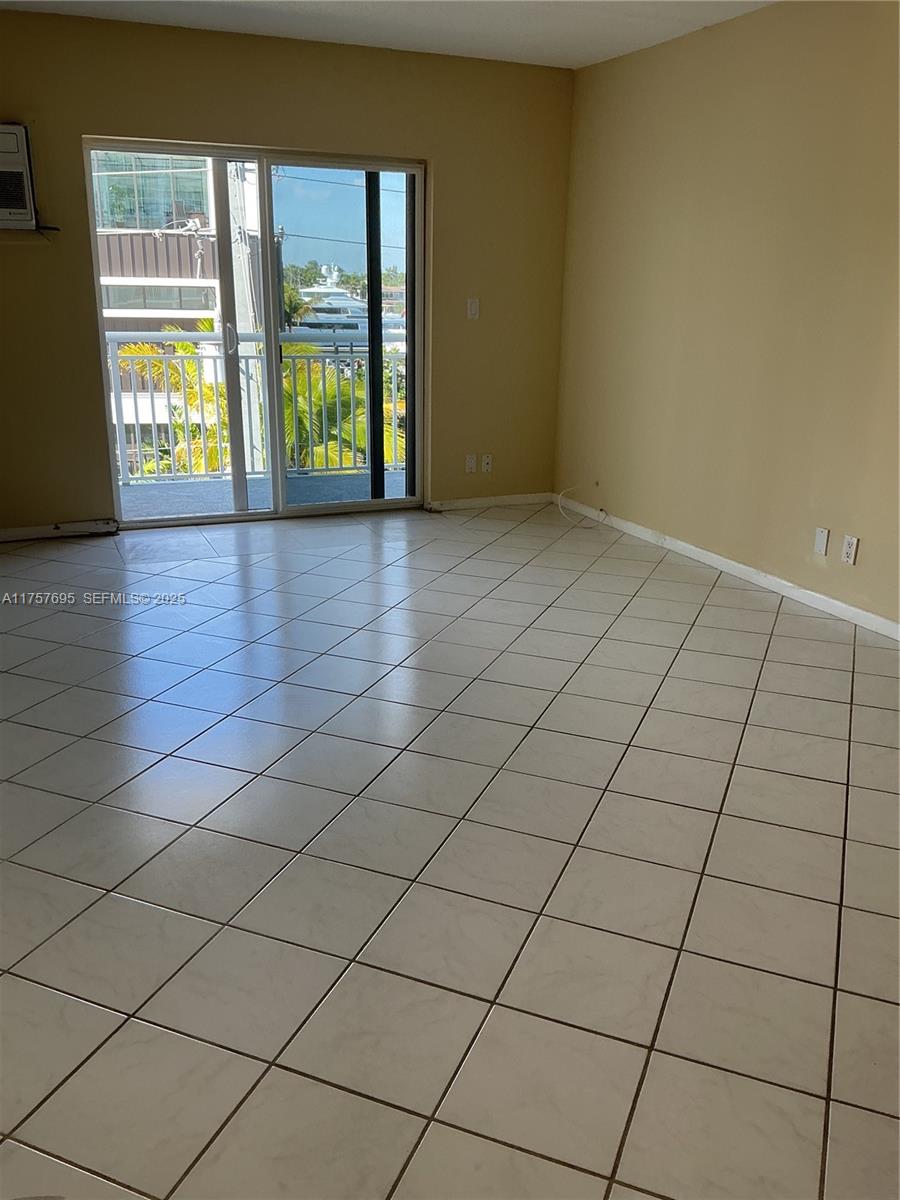 200 South Birch Road, Unit 404 Fort Lauderdale, FL 33316 - Photo 2 of 18 a view of an empty room and window