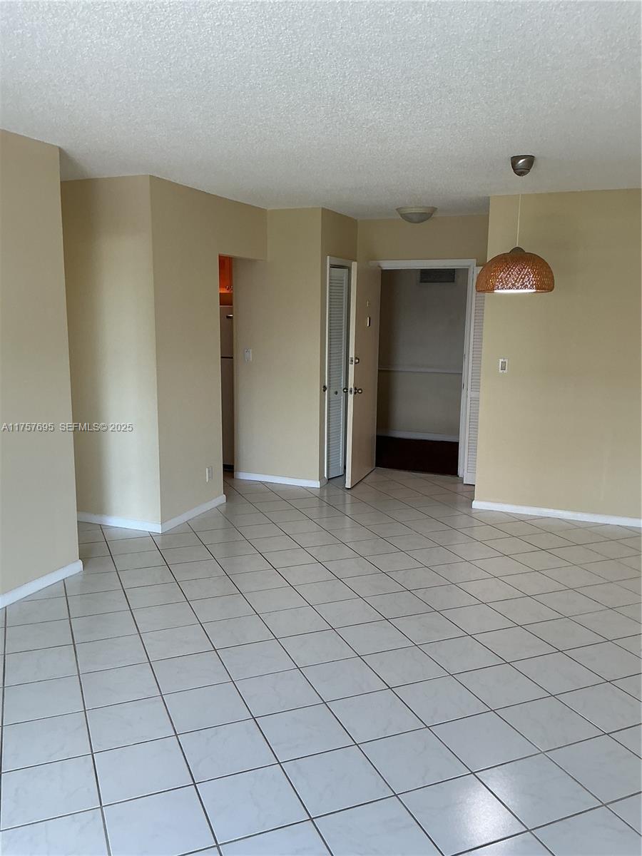 200 South Birch Road, Unit 404 Fort Lauderdale, FL 33316 - Photo 3 of 18 an empty room with a bathroom