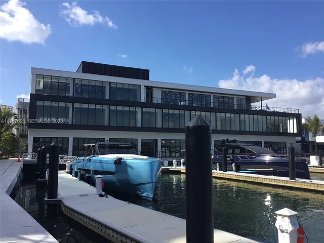 a roof deck view with couches and potted plants
