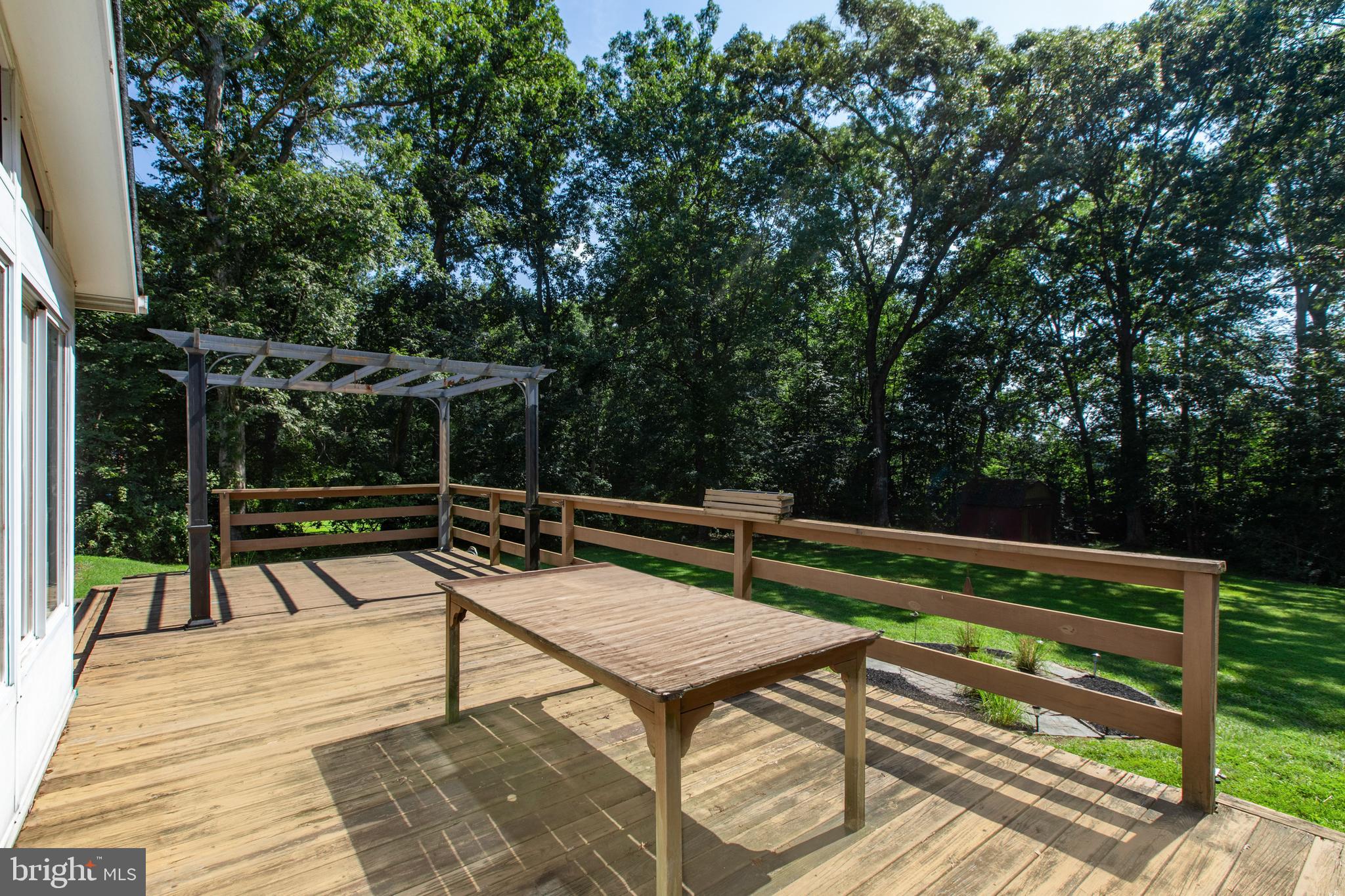 2402 Beverly Drive Joppa, MD 21085 - Photo 11 of 53 a view of sitting area with furniture and wooden deck