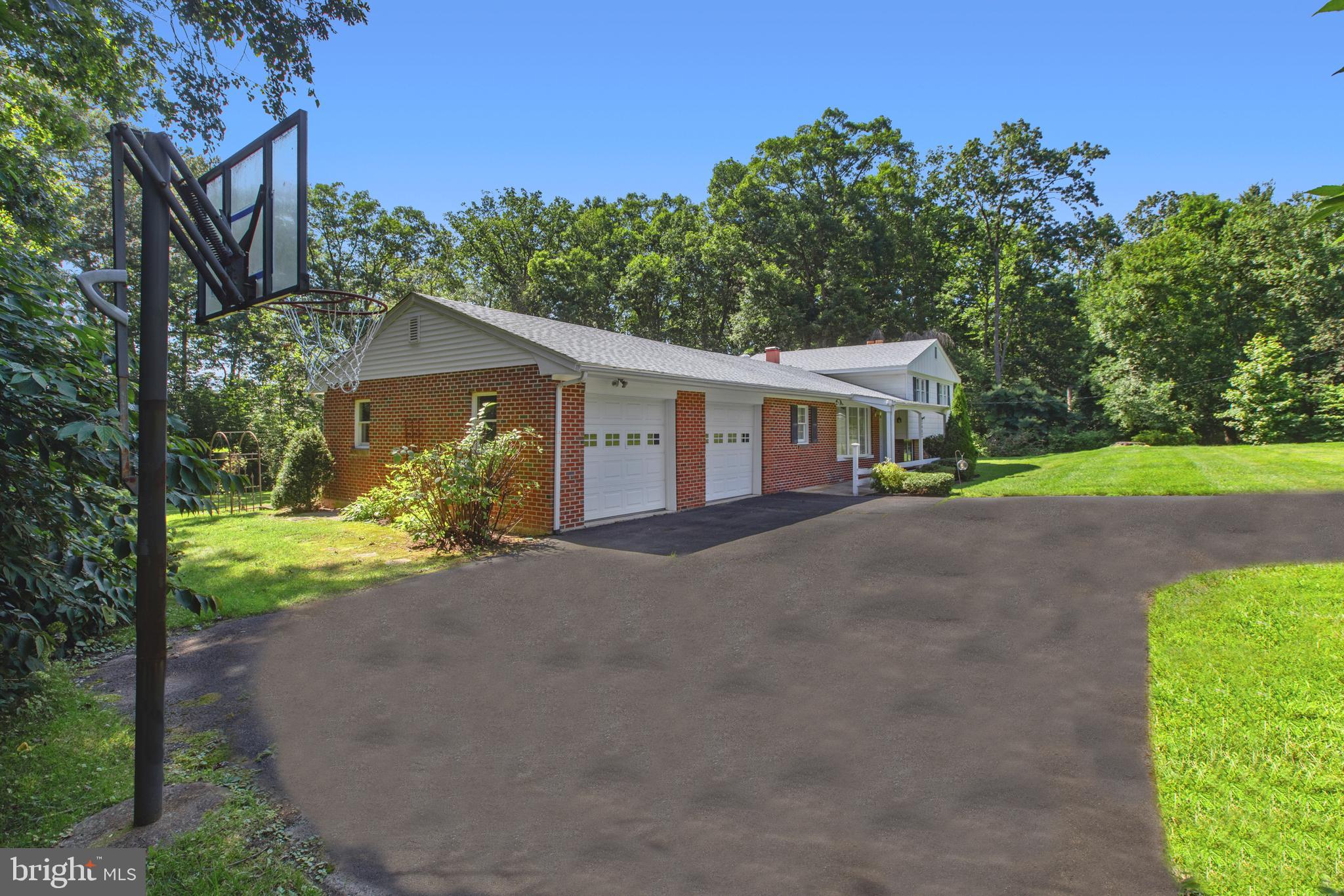 2402 Beverly Drive Joppa, MD 21085 - Photo 3 of 53 a view of a house with backyard and a garden