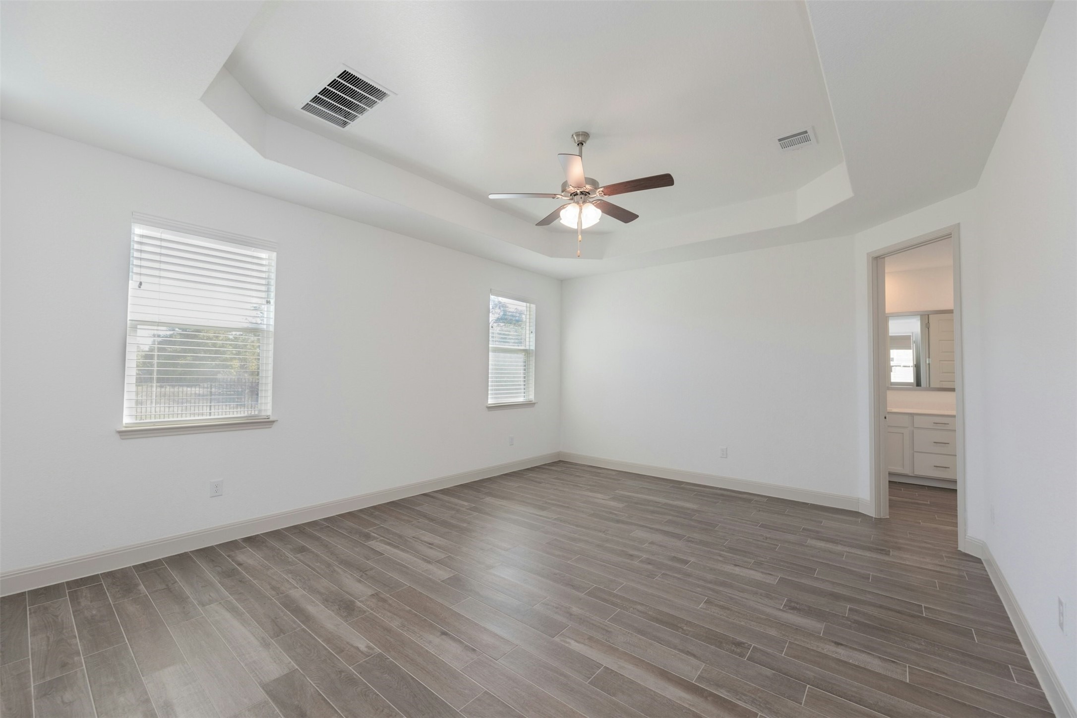 1736 Weavers Bend Georgetown, TX 78628 - Photo 16 of 40 Primary with soaring tray ceilings.