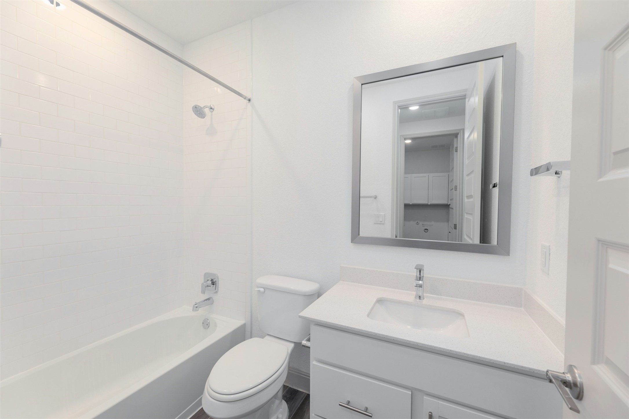 1736 Weavers Bend Georgetown, TX 78628 - Photo 31 of 40 The full guest bathroom, featuring a shower/tub combo, is easily accessible from the main living area, offering convenience for guest and entertaining.